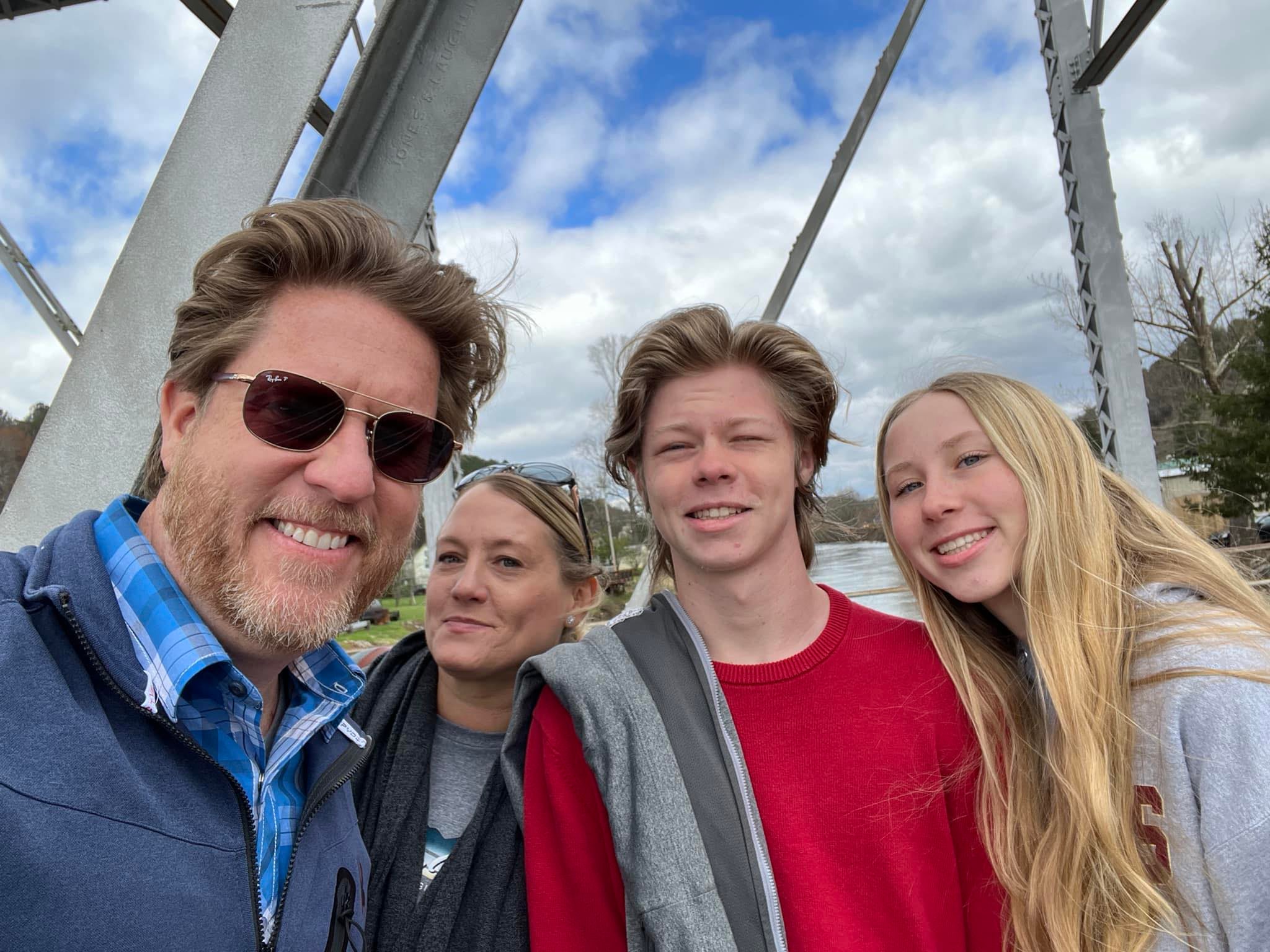 Chad with family at a youth football event
